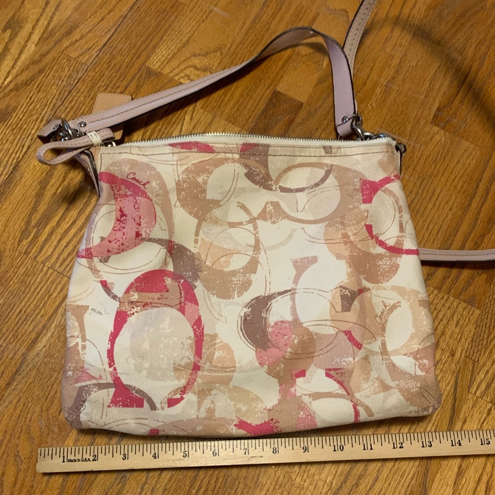 Coach bag with pink and tan logos